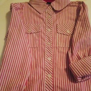 We are selling a girls shirt size 14.